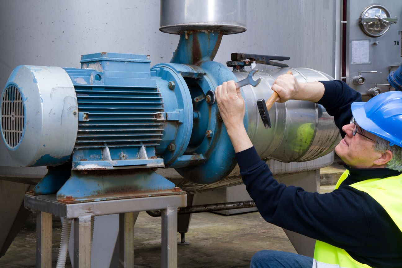 Mechanic working on motor